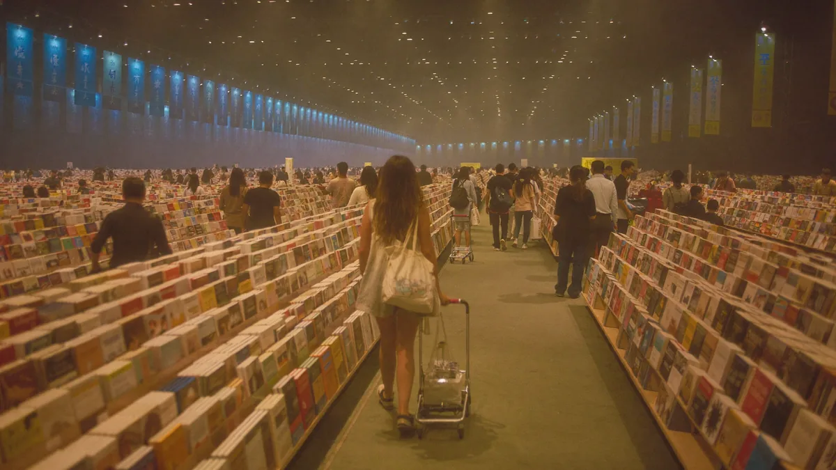 Crowds browsing books at the Hong Kong Book Fair in the Convention Centre